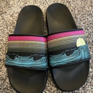 Roxy Black Slide Sandals with Sunset Wave Print